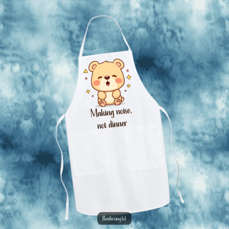 Funny bear apron showing a curious bear experimenting with mouth shapes for unique sounds, a humorous kitchen gift.