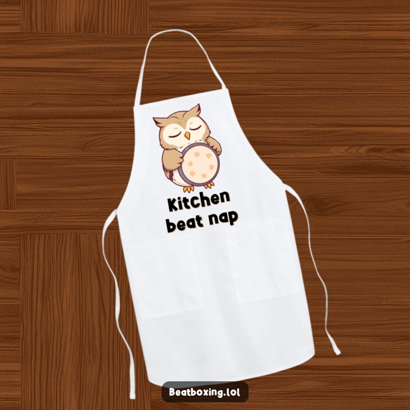 Funny owl apron showing a sleepy character mimicking a kick drum with its belly, a hilarious and practical kitchen accessory.