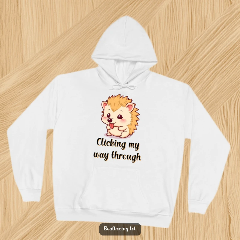Funny Hoodie depicting a small hedgehog mid-tongue click, a humorous and cozy addition to any wardrobe.