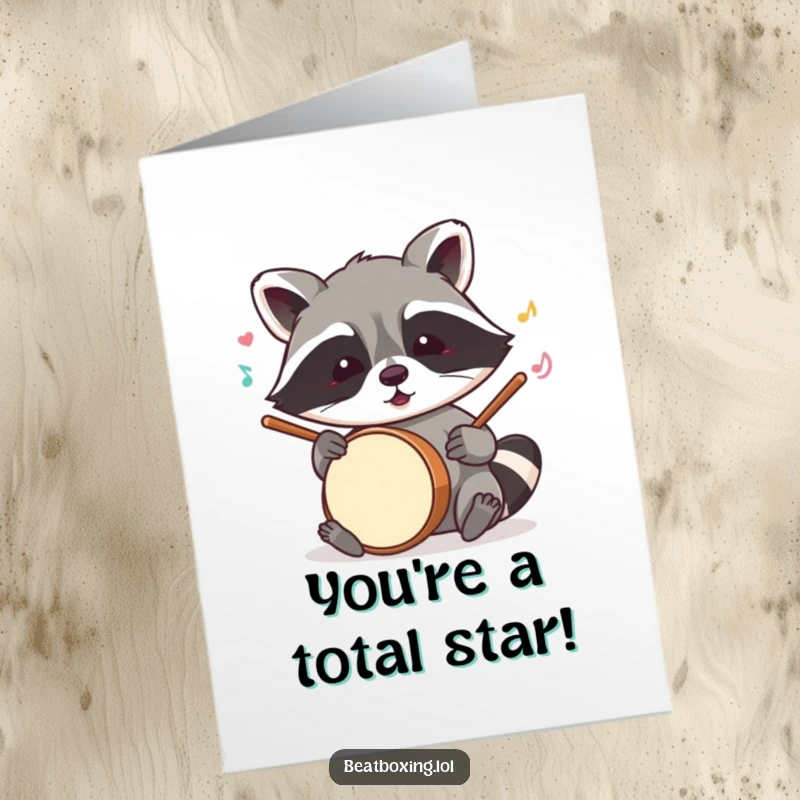 Funny free printable congratulations card showing a cheeky raccoon tapping out a beat with its paws.