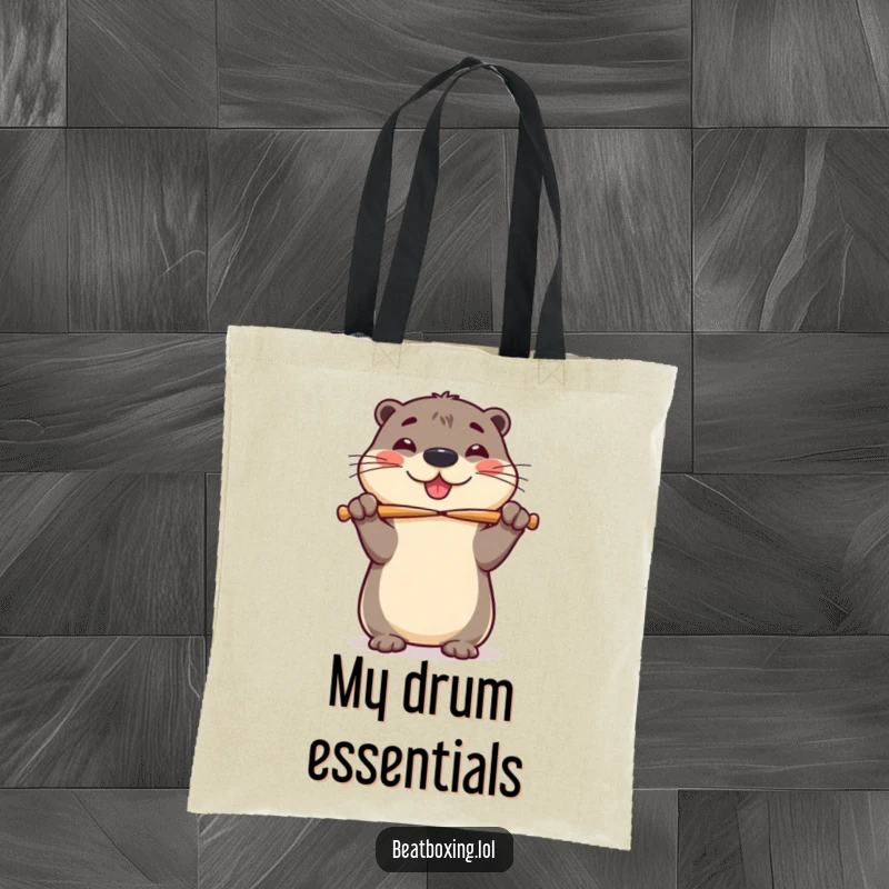 Funny tote bag showing a cheerful otter balancing drumsticks on its nose, embodying playful percussion.